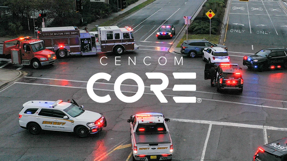 image of emergency vehicles assembled at crossroads, with Whelen Cencom Core branding at center of image