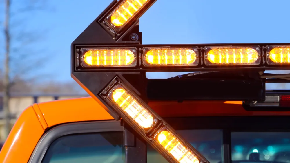 image of utility truck with amber Whelen Traffic Advisor arrow