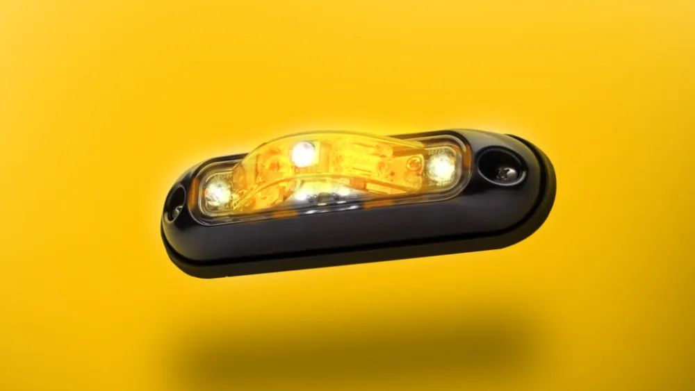 image of amber Whelen ION V-Series lighthead on yellow background