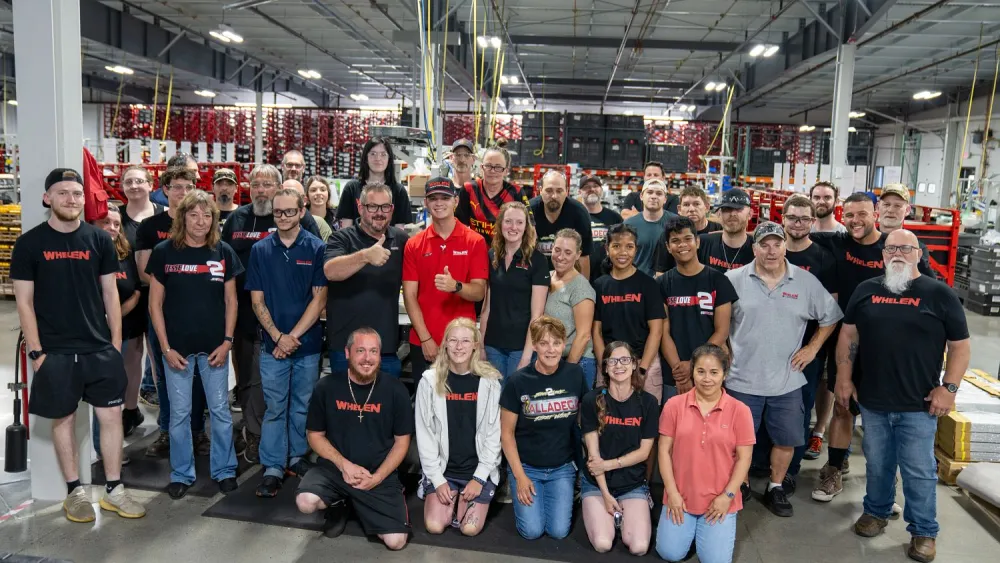 The lightbar production team poses for a photo with Jesse and Danny.