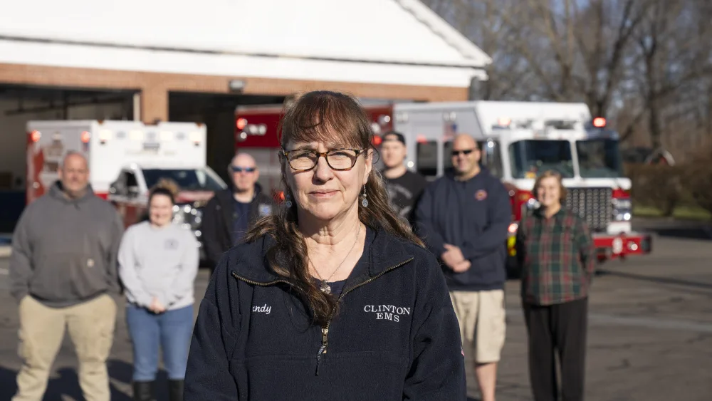 image of 2023 Whelen Everyday Champion Sandy Voss with EMS colleagues and crew in Clinton, CT