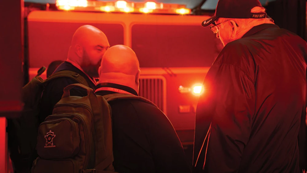trade show attendees previewing fire truck emergency lighting solutions